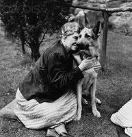 Helen Keller and her guide dog